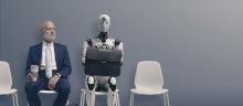 Man and robot waiting for an interview