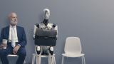 Man and robot waiting for an interview